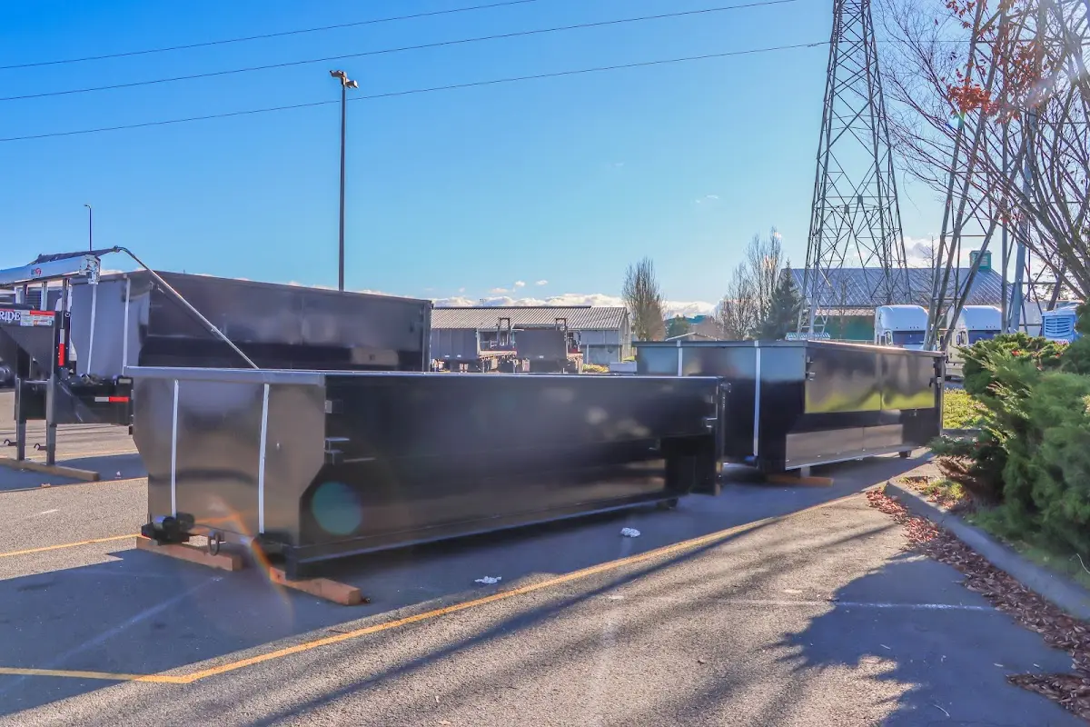 Roll-off dumpster ready for waste disposal at job site for 2 Yard Dumpster Rental in Trenton
